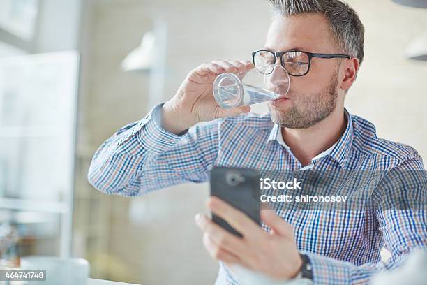 Refreshment During Work Stock Photo - Download Image Now - Water, Drinking, Office