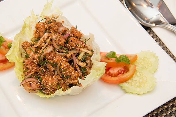 istock Thai spicy Tuna  salad on white plate 464742540