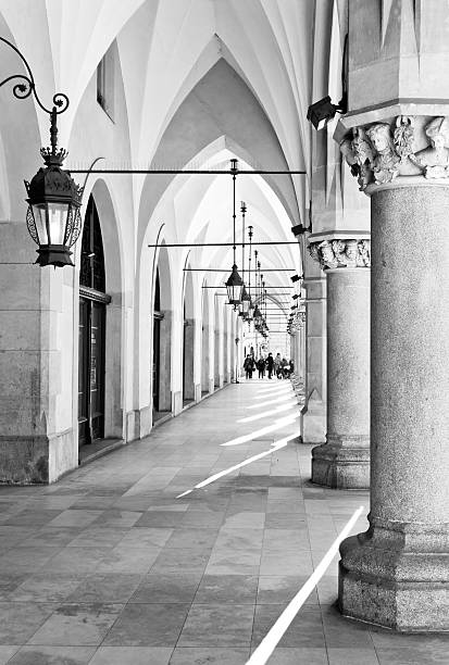 Old historical arcade in Loretanska Street near Prague Castle, Prague, Czech Republic. Black and white image