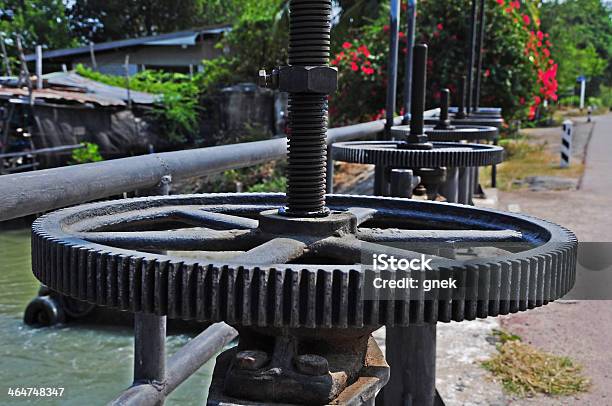 Irrigation Canal And Floodgate Valve Stock Photo - Download Image Now - Agricultural Machinery, Agriculture, Blue