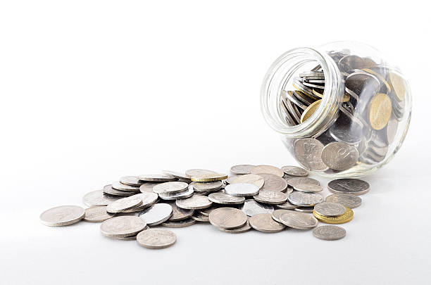 istock Malaysian Coin in glass container. 464750420