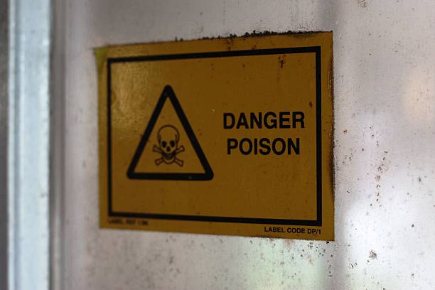 istock yellow danger poison warning sign 464753954