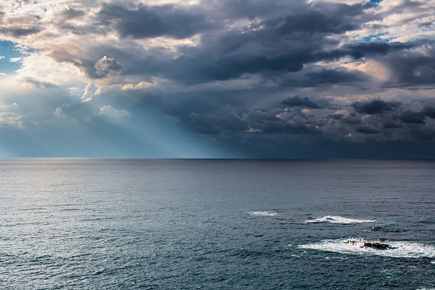 istock Ocean Skyscape with Shafts of Light 464754656