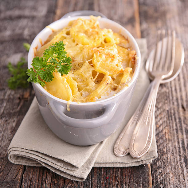 istock Gratin on grey napkin with fork and spoon 464754782