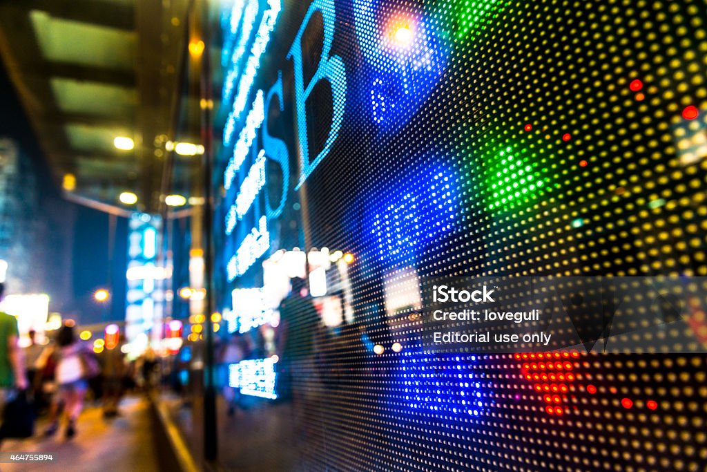 Hongkong stock exchange market display screen board on the street. Hongkong, Сhina- August 3, 2012: Hongkong stock exchange market display screen board on the street. Hongkong is the third financial center of the world beside New york and London. 2015 Stock Photo