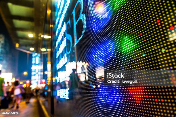 Hongkong Stock Exchange Market Display Screen Board On The Street Stock Photo - Download Image Now