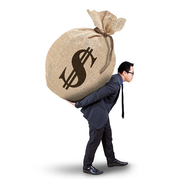 istock Male entrepreneur carrying money sack 464756090