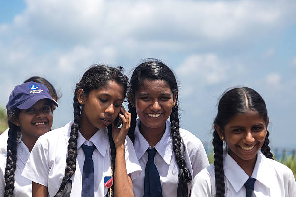 Sigiriya, Sri Lanka - February 28, 2014: Group portrait of school students visiting Sigiriya complex, UNESCO listed World Heritage Site.
