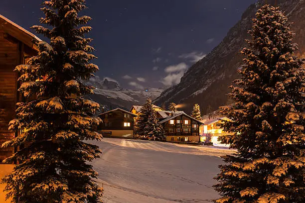 Winter night view with clear sky of the tasch valley, the gate to Zermatt, Switzerland