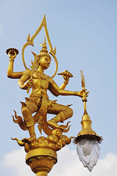 istock golden angel lighting pole, Thai style statue 464769889