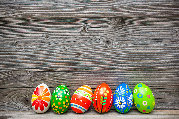 istock eater eggs on old wooden background 464776216