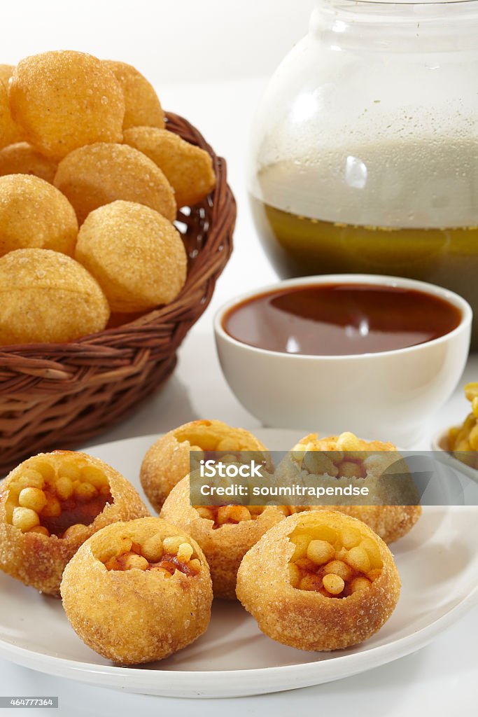 Panipuri, Golgappe, Chat item, India Panipuri is tasty snack food item spicy and sweet 2015 Stock Photo