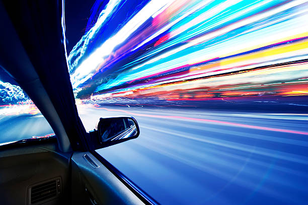 istock car on the road with motion blur background 464779896