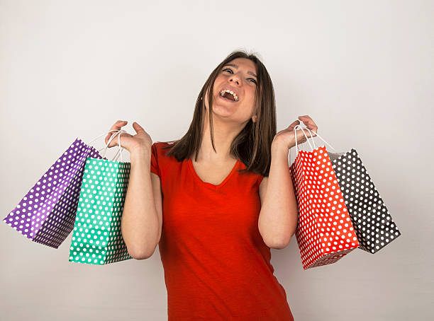istock happy young girl after shopping 464780504