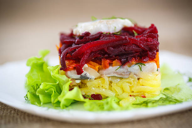 istock salad with herring and boiled vegetables 464789374