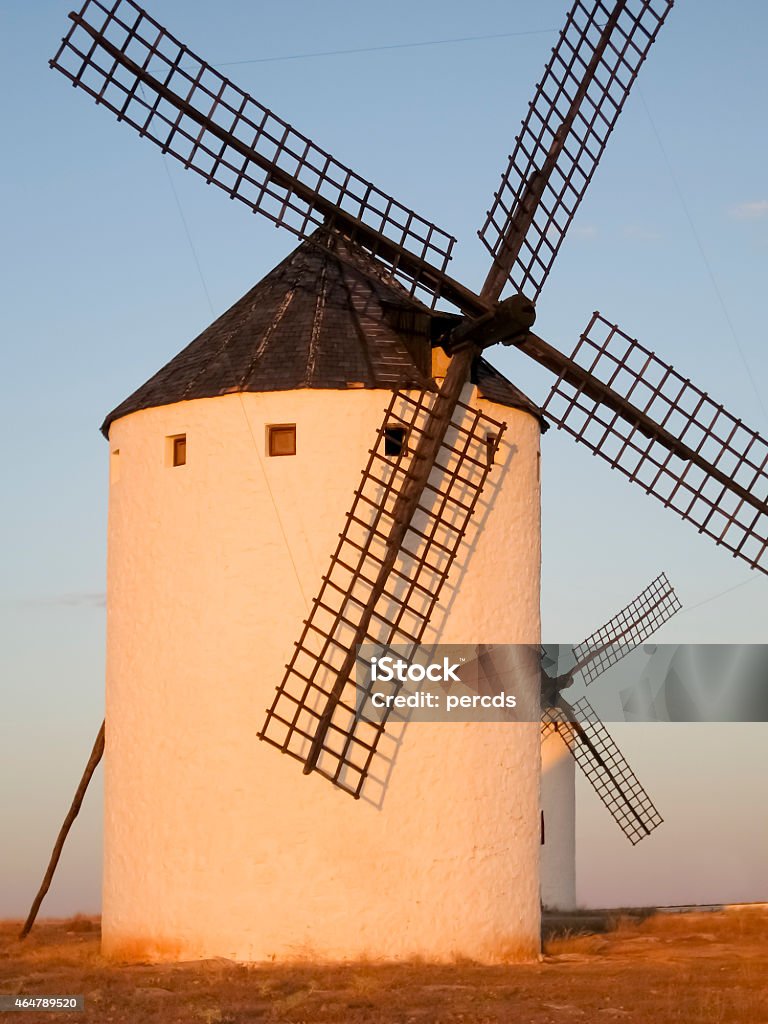 Windmill in Castilla La Mancha, Spain. Close up of windmill in Campo de Criptana, Castilla La Mancha, Spain, landmark in Don Quixote touristic route.  2015 Stock Photo