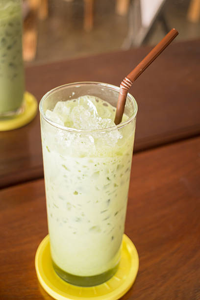 istock Glass of iced green tea latte 464791844