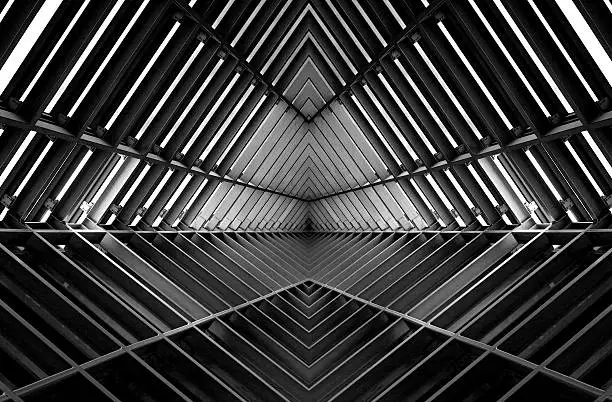 Photo of metal structure similar to spaceship interior in black and white