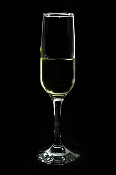 istock Glass of White Wine Isolated on Black 464792932