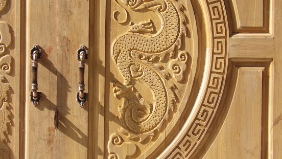 close up of door,dragon on wood