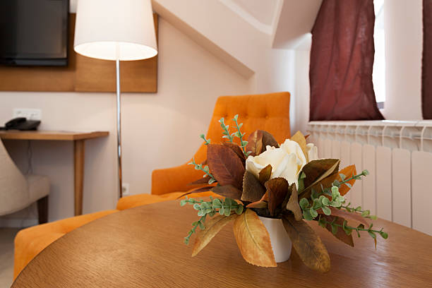 istock Flowers on table in hotel room 464794382