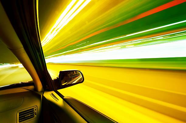 istock car on the road with motion blur background 464797088