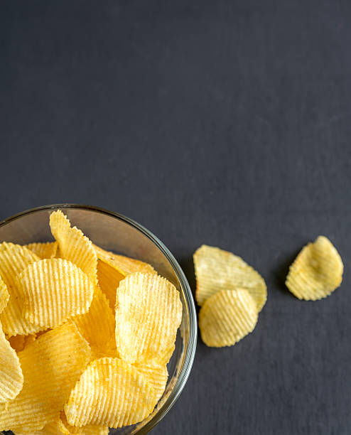 istock Potato chips in the glass bowl 464797494