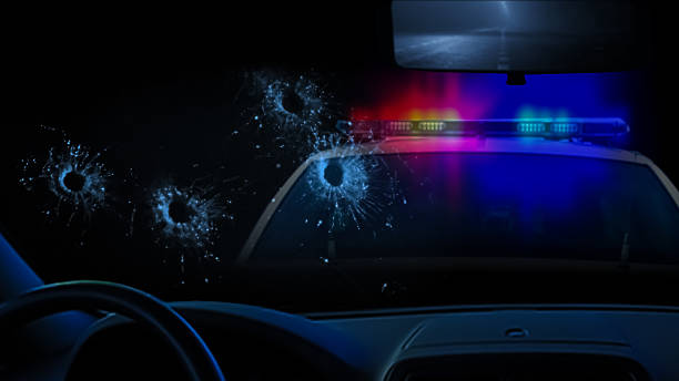 Police car and bullet holes in glass Police shootout shooting a weapon photos stock pictures, royalty-free photos & images
