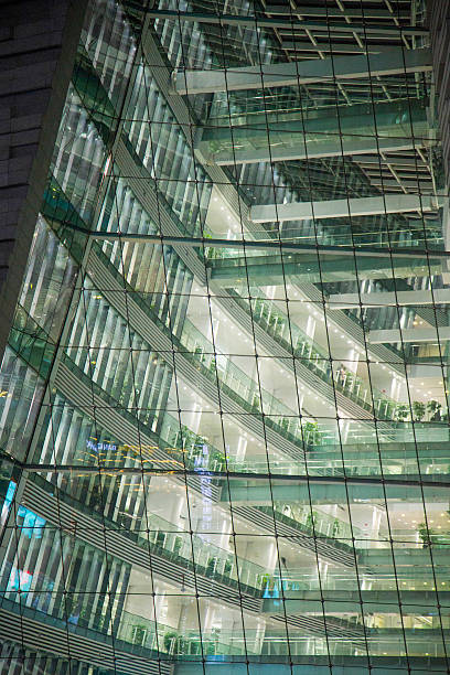 istock Glass building at night lit from the interior 464798600