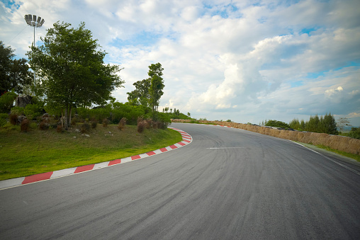 racetrack straight to the mountain with clear sky.