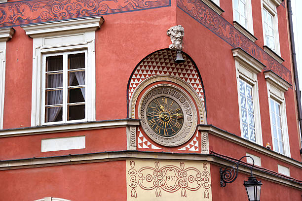 istock Old clock on the wall, Warsaw, Poland 464802726