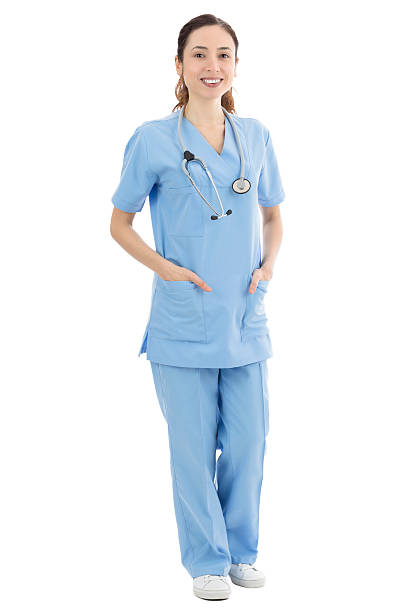 istock Friendly female nurse or doctor standing, full length 464806782