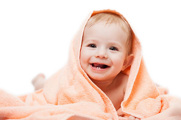 Little cute newborn baby child Little cute newborn baby child first milk or temporary teeth smiling face white isolated baby teeth stock pictures, royalty-free photos & images