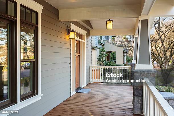 Large Porch Exterior Of An Upscale Home With Lights Stock Photo - Download Image Now