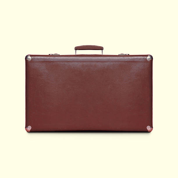 istock Retro vintage brown suitcase isolated on a white background 464810834