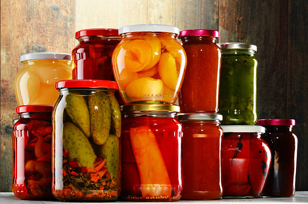 istock Jars with pickled vegetables, fruity compotes and jams isolated 464811274
