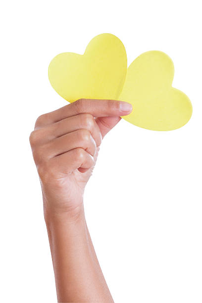 istock hand holding paper heart, 464812145