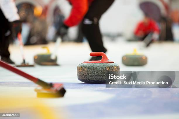 Sport Of Curling Being Played On A Field Stock Photo - Download Image Now - Curling - Sport, Sport, Ice