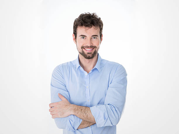 istock young crossed arms man with shiny smile 464815684