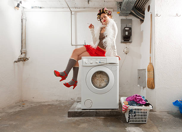 istock housewife bored in the laundry 464819848