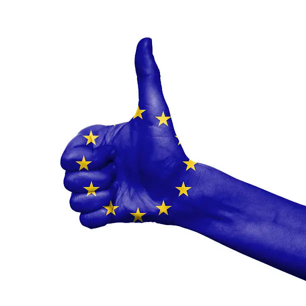 EU flag painted on hand over white background