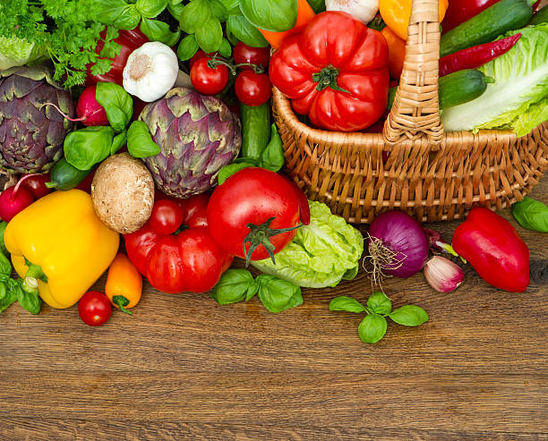 istock fresh vegetables and herbs on wooden 464824213
