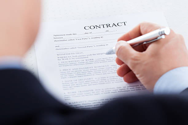 istock Businessman Filling The Contract Form 464825589