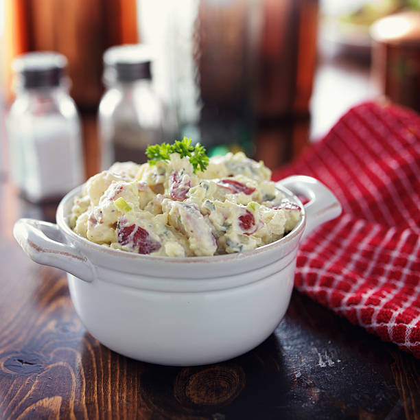 istock potato salad with parsley garnish 464825606