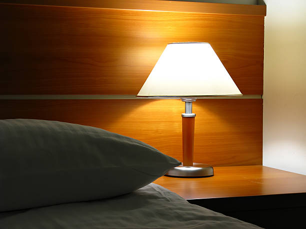 istock Hotel room corner showing pillow and lamp 464825741
