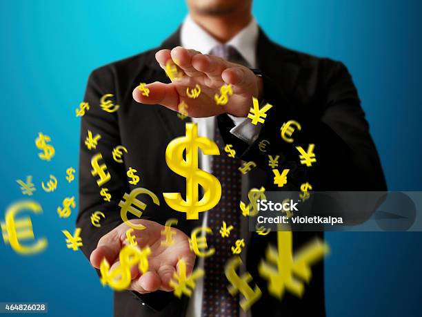 Businessman With Financial Symbols Stock Photo - Download Image Now - 2015, Adult, Business
