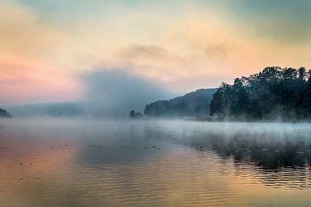 istock Fog over the lake at sunrise 464830161
