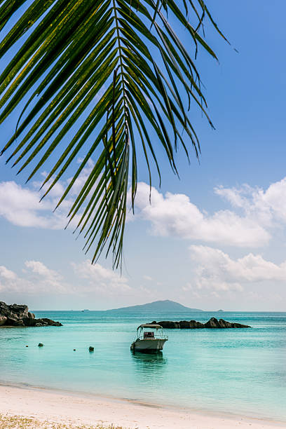 istock Boat on Tropical beach at Curieuse island Seychelles 464830658