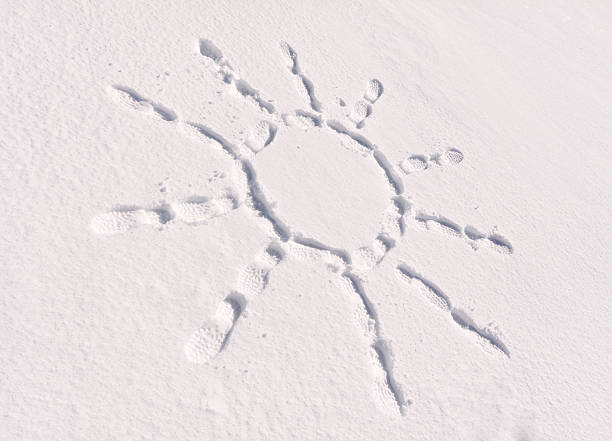 istock footstep trails winter snow at sunny day 464831081