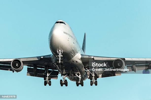 Jumbo Jet Airplane Landing Stock Photo - Download Image Now - 2015, Above, Aerospace Industry